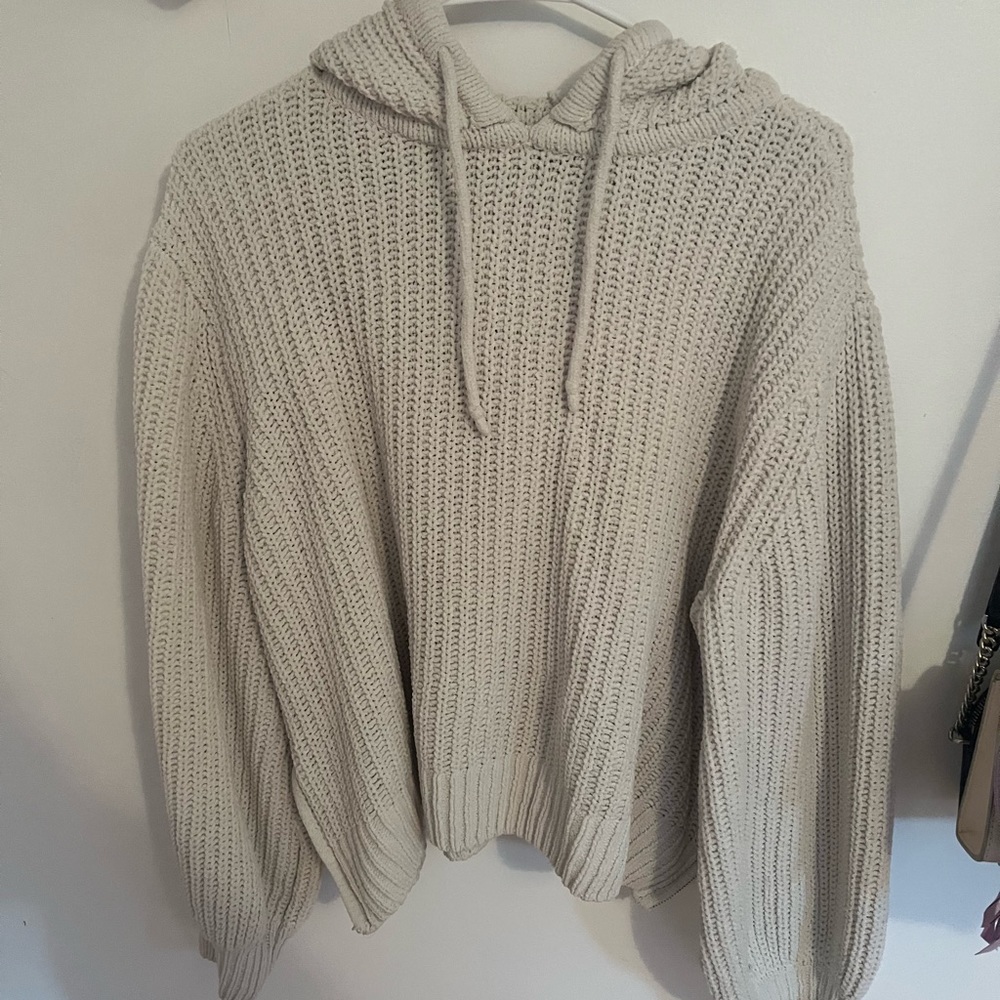 Cream, hoodie, with drawstrings.